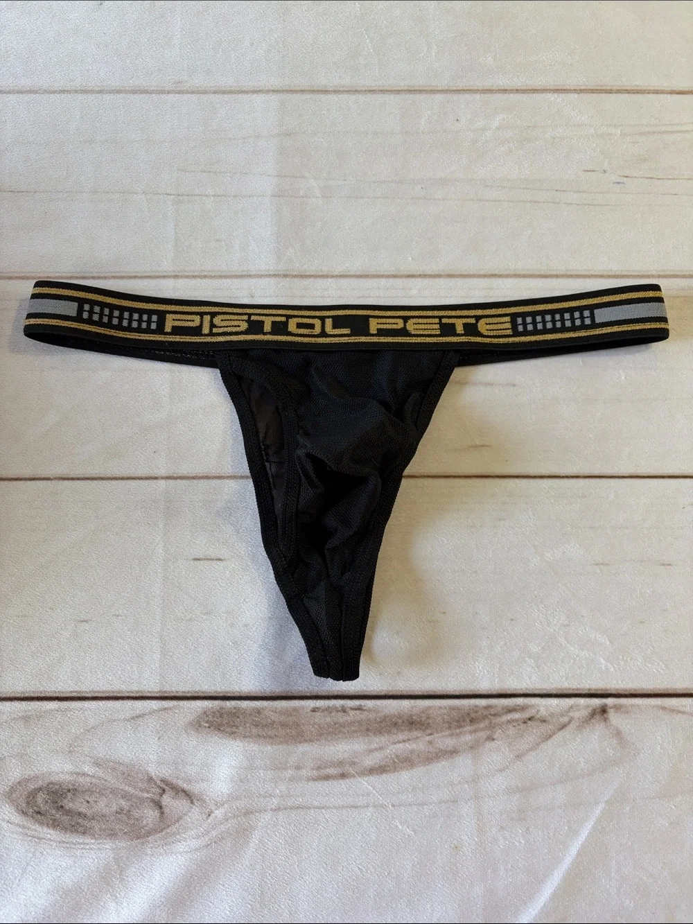 Pistol Pete Men's Black Mesh Thong with Gold Waistband